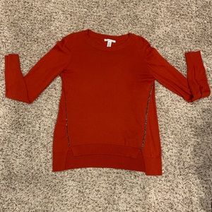 Rust sweater.